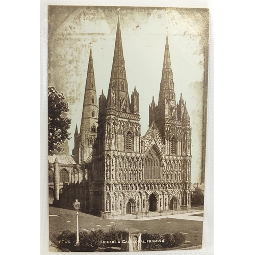 680 - Collection of postcards arranged in an album, some black and white photographic including cathedrals... 