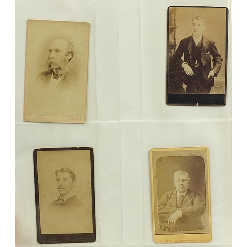 688 - Collection of Victorian cabinet cards arranged in three albums