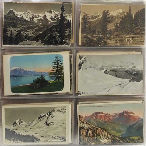 690 - Collection of continental topographical postcards arranged in an album, some black and white photogr... 