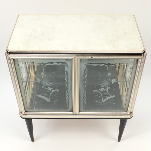 914 - 1950's Retro Italian style glass cabinet, the bow fronted doors and sides etched with musical lyre i... 