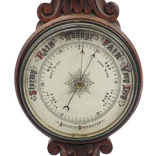 932 - Carved oak wall hanging aneroid barometer, 82cm high