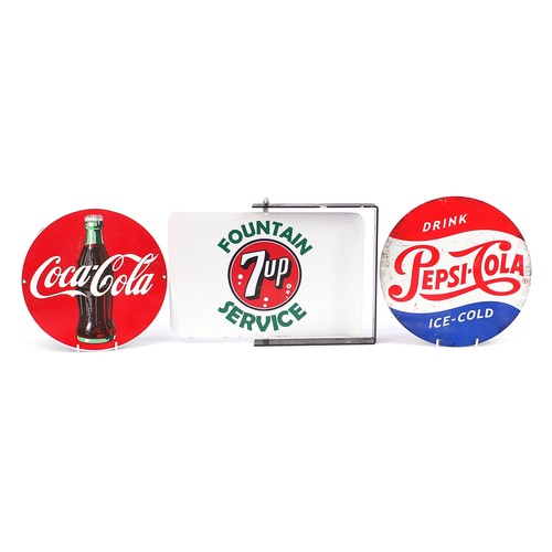 340 - Three enamelled metal advertising signs comprising rotating 7 Up, Pepsi Cola and Coca Cola, the larg... 