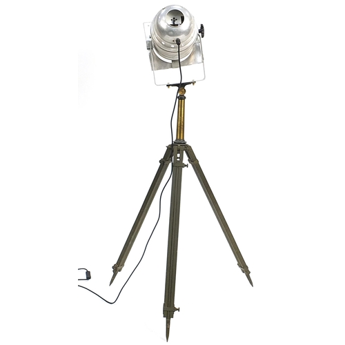 891 - Industrial spotlight with extending tripod base, 145cm high not extended