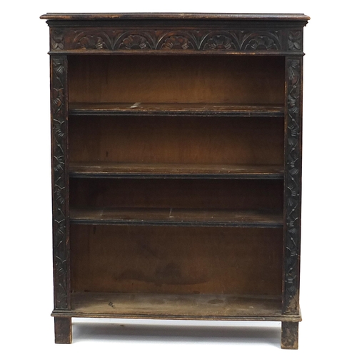 834 - Carved oak open bookcase fitted with three adjustable shelves, 118cm H x 91cm W x 29cm D