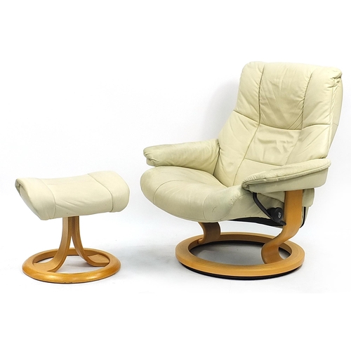 843 - Stressless Ekornes, cream leather easy chair and footstool, 100cm high