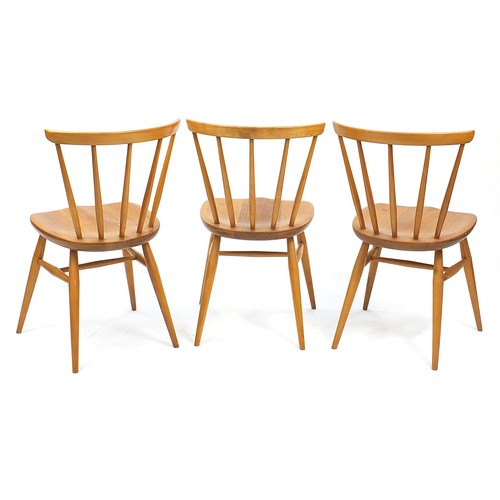 909 - Set of three Ercol light elm stick back chairs, 76cm high