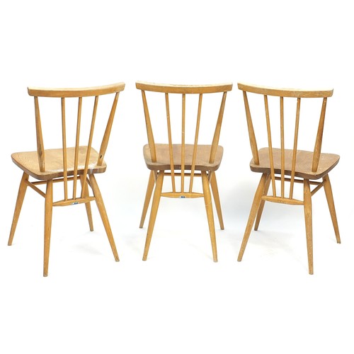 910 - Set of three Ercol light elm stick back chairs, 79cm high