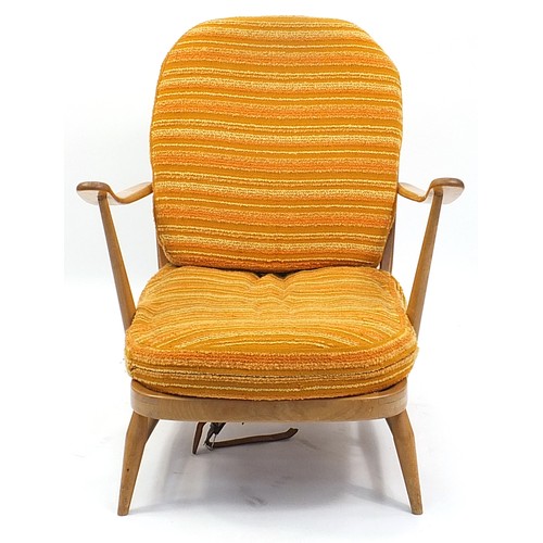 846 - Ercol light elm stick back armchair, 75cm high