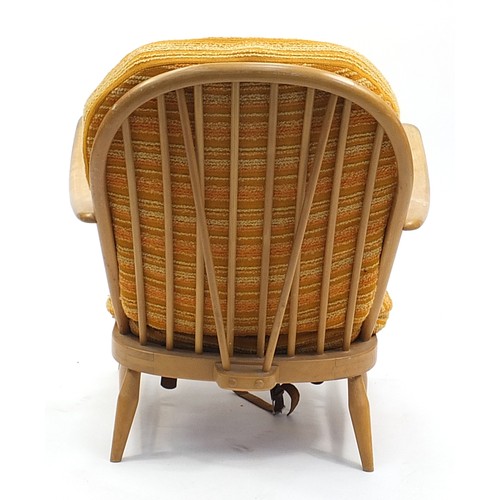 846 - Ercol light elm stick back armchair, 75cm high