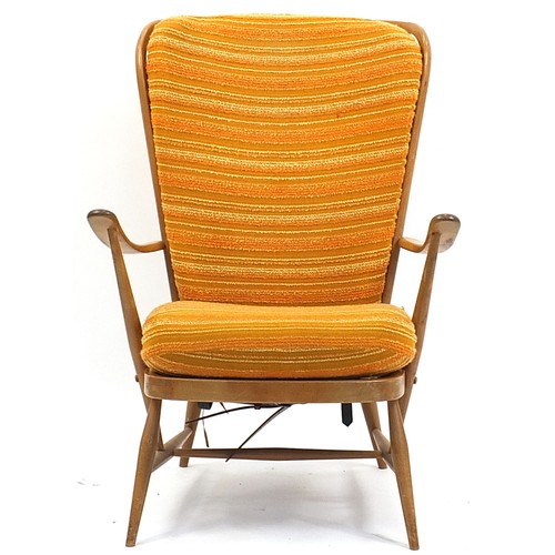 845 - Ercol light elm stick back armchair, 101cm high