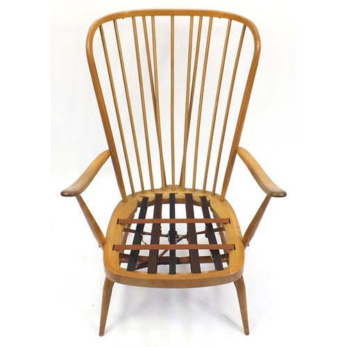 845 - Ercol light elm stick back armchair, 101cm high