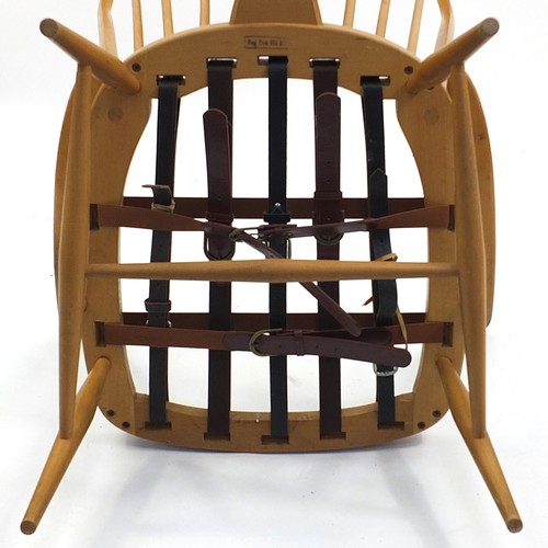 845 - Ercol light elm stick back armchair, 101cm high