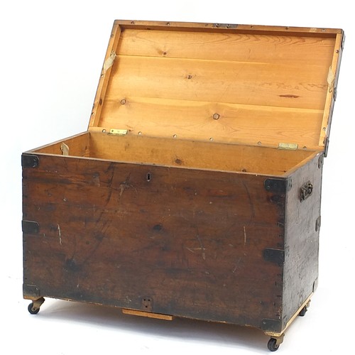 853 - Antique metal bound trunk with cast iron handles, 61cm H x 87.5cm W x 45.5cm D