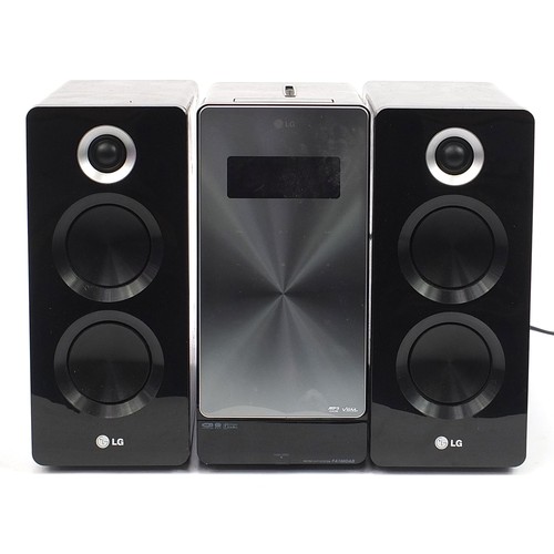 1067A - LG Micro HiFi system with speakers, model number FA166DAB