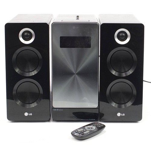 1067A - LG Micro HiFi system with speakers, model number FA166DAB