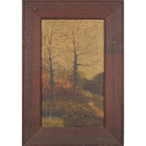 524 - A Nielsen 1919 - Woodland landscape with figure, early 20th century oil on canvas, framed, 41.5cm x ... 