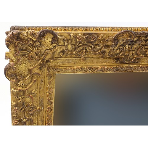 876A - Ornate gilt framed wall mirror, 75cm x 64cm