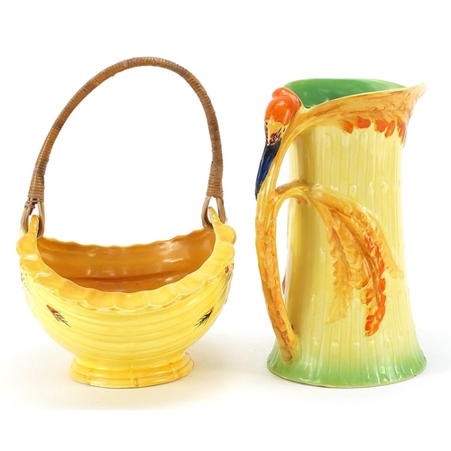 616 - Burley Ware floral basket and jug with parrot design handle, the largest 22cm high