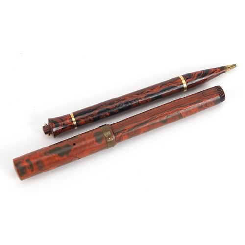 182 - Brown Ripple fountain pen with 18ct rolled gold mounted lid and 14ct gold nib together with a Rosema... 