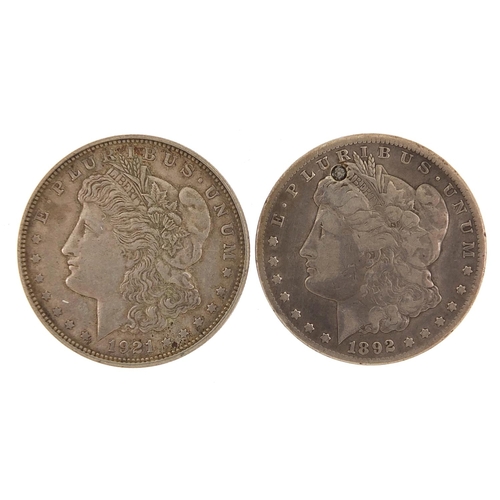 1597 - Two American dollars comprising dates 1892 and 1921