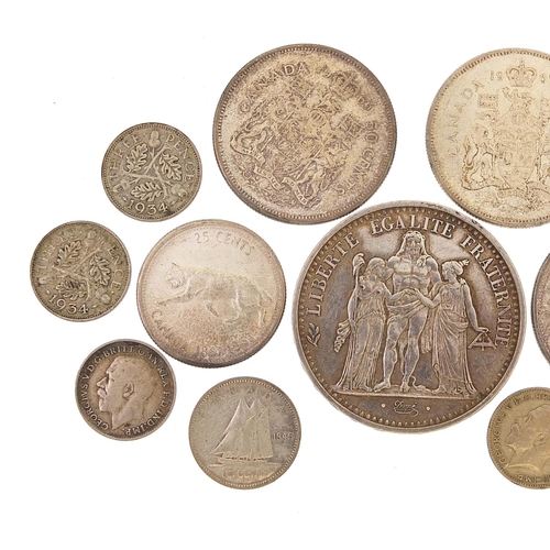 1587 - British and world coinage, some silver including French 1967 ten francs and Canadian fifty cents, to... 