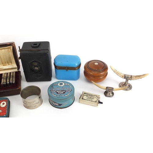 979 - Objects and sundry items including advertising tins, Zeiss Ikon baby box camera, blue opaline glass ... 