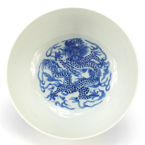 1126 - Chinese blue and white porcelain bowl hand painted with roundels of dragons amongst clouds, six figu... 