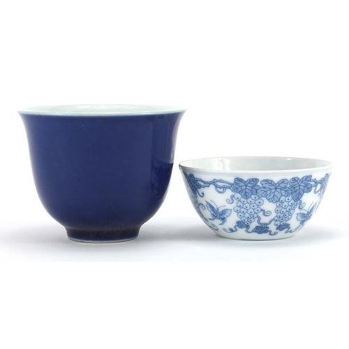 934 - Two Chinese porcelain bowls including one having a blue glaze, character marks to the bases, the lar... 