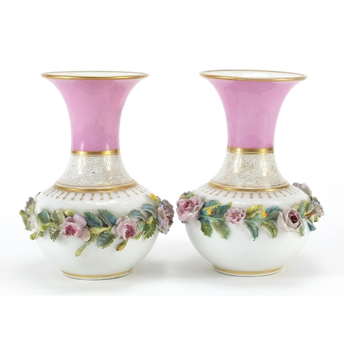 501 - Pair of 19th century French pink ground vases with floral encrusted band, each 16cm high