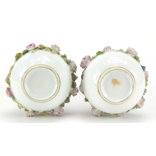 501 - Pair of 19th century French pink ground vases with floral encrusted band, each 16cm high