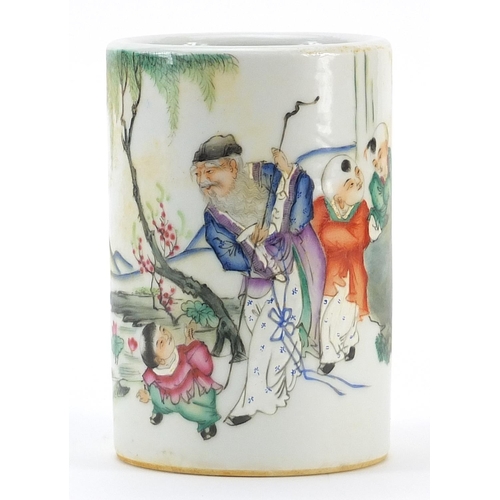 1077 - Chinese porcelain brush pot hand painted in the famille rose palette with an Elder and children, red... 