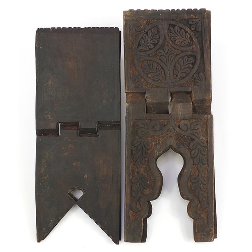 1048 - Two Islamic folding hardwood Quran stands including a lacquered example with traces of paint, the la... 