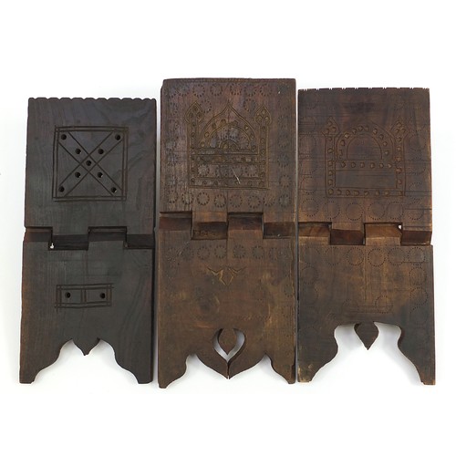 1047 - Three Islamic carved hardwood folding Quran stands including two carved with mosques, the largest 43... 