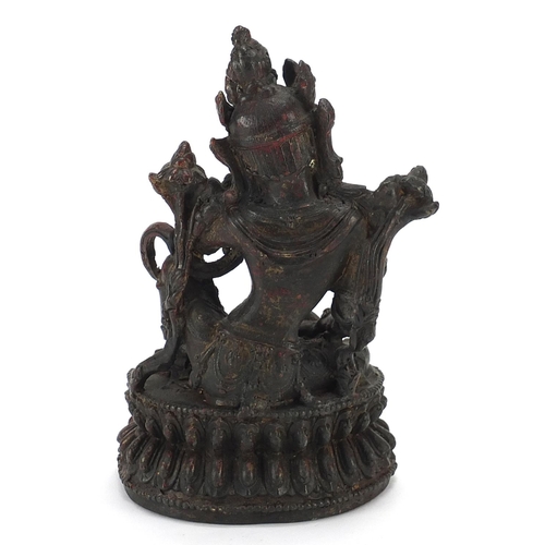 1019 - Chino Tibetan patinated bronze figure of a deity, 19.5cm high