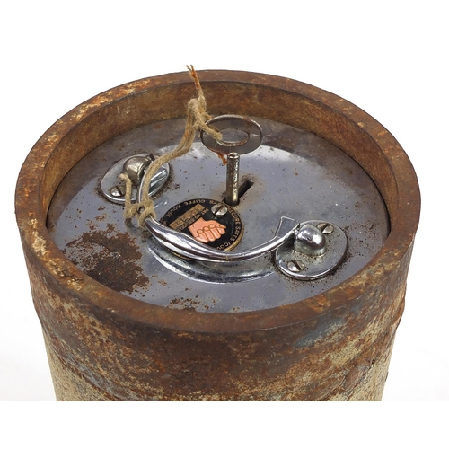 621 - Cast iron Secure Safes cylindrical floor safe with key, 31cm high x 15.5cm in diameter