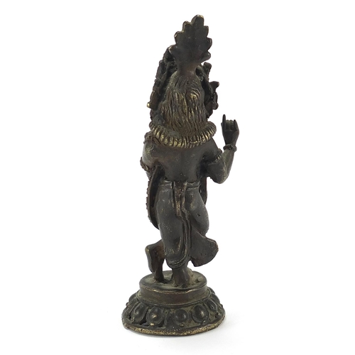 914 - Indian patinated bronze deity, 14.5cm high