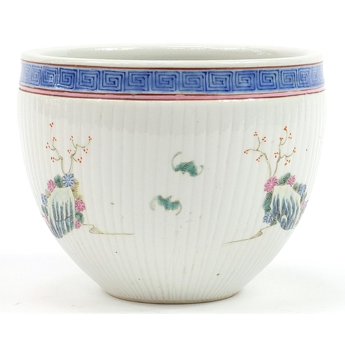 224 - Chinese porcelain jardiniere hand painted in the famille rose palette with an emperor and attendants... 