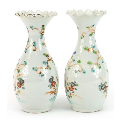 903 - Pair of Japanese porcelain vases hand painted with birds and flowers, each 15cm high