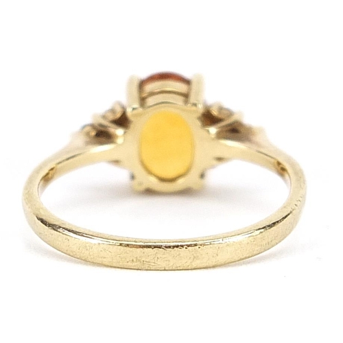 1988 - 9ct gold diamond and orange stone ring, size I/J, 1.8g