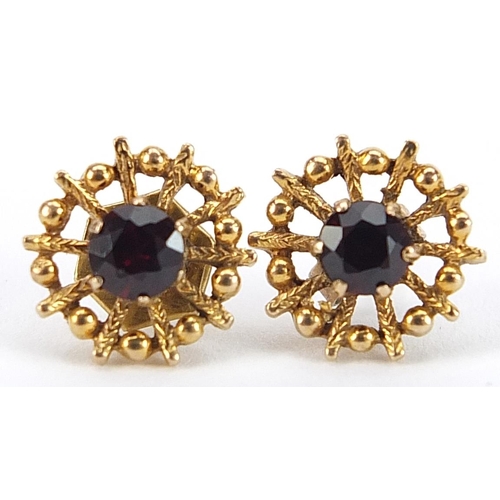 1865 - Pair of 9ct gold garnet solitaire stud earrings, 11mm in diameter, 2.1g