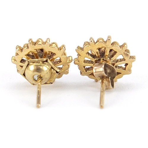 1865 - Pair of 9ct gold garnet solitaire stud earrings, 11mm in diameter, 2.1g