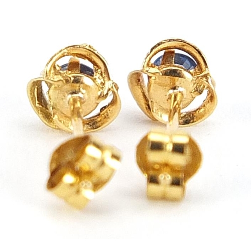 2090 - Pair of 9ct gold sapphire solitaire stud earrings, 5.2mm in diameter, 0.4g