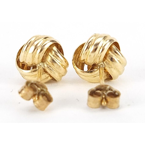 2044 - Pair of 9ct gold knot design stud earrings, 8mm in diameter, 0.6g