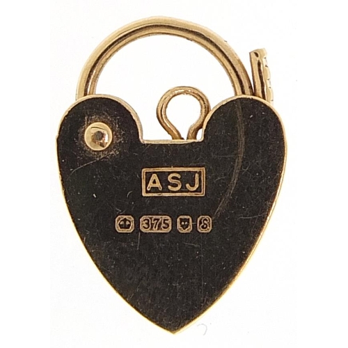 2030 - 9ct gold love heart padlock with engraved decoration, 1.5cm high, 0.9g