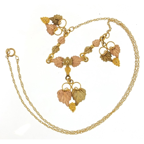 1657 - Black Hills, 10k gold and 14k gold three tone grapevine necklace, 42cm in length, 6.3g