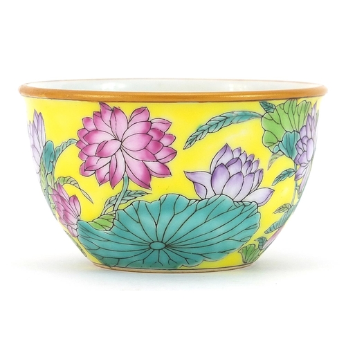 1205 - Chinese porcelain yellow ground bowl hand painted in the famille rose palette with flowers, six figu... 