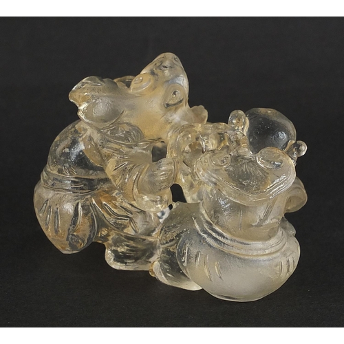 1106 - Chinese rock crystal carving of two boys and a mythical animal, 6cm wide