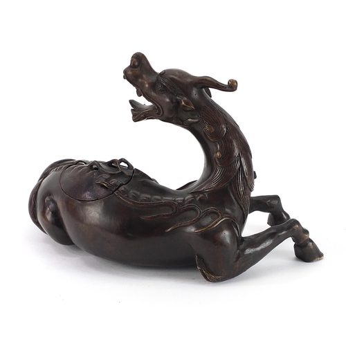 164 - Chinese patinated bronze incense burner in the form of a mythical dragon, 25.5cm in length