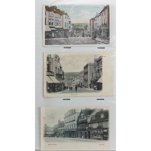 1517 - Collection of Lewes and Brighton related postcards arranged in an album, some black and white photog... 