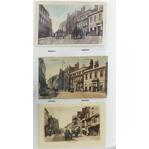 1517 - Collection of Lewes and Brighton related postcards arranged in an album, some black and white photog... 